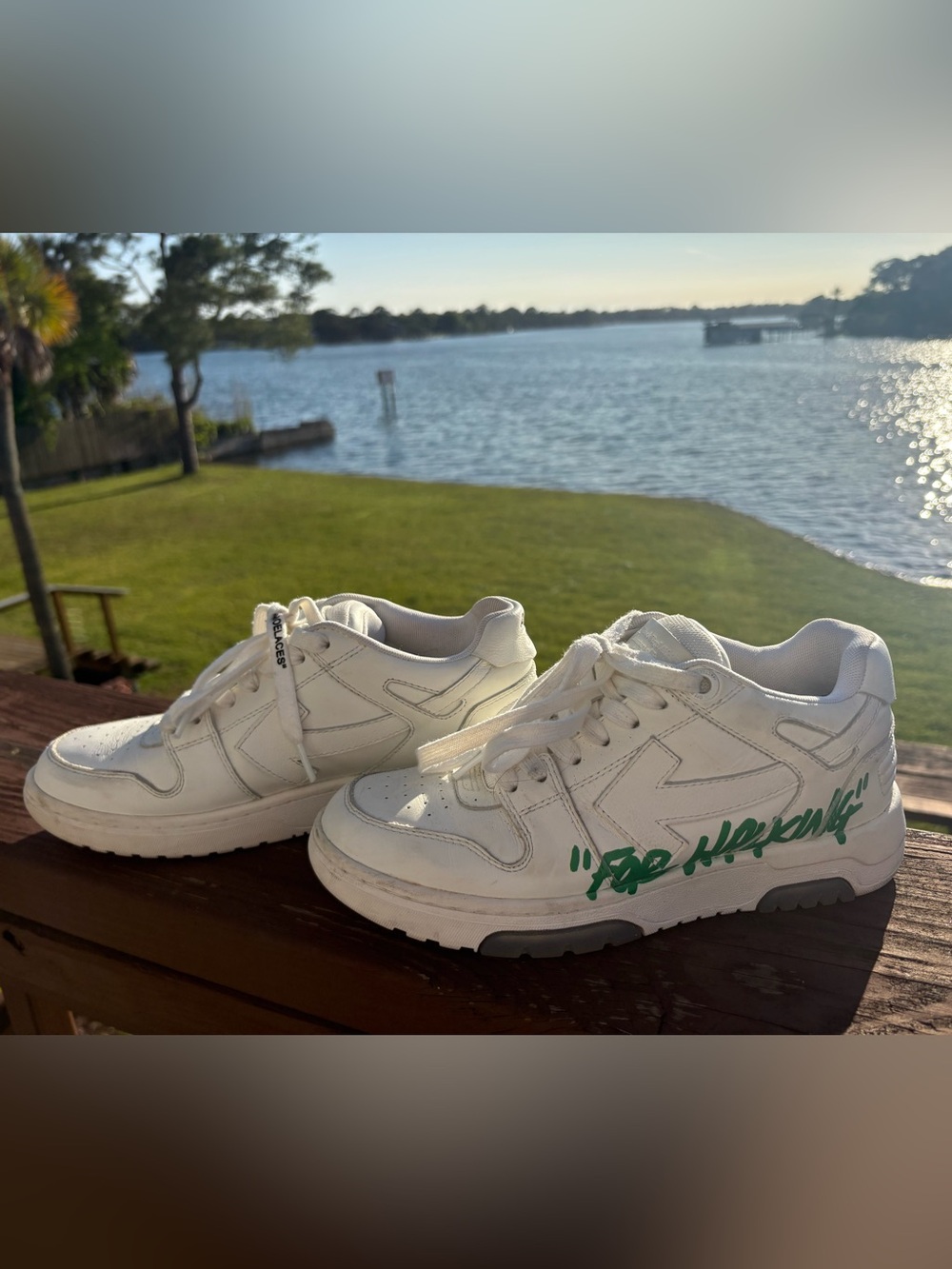 OffWhite women’s white sneakers with green lettering
